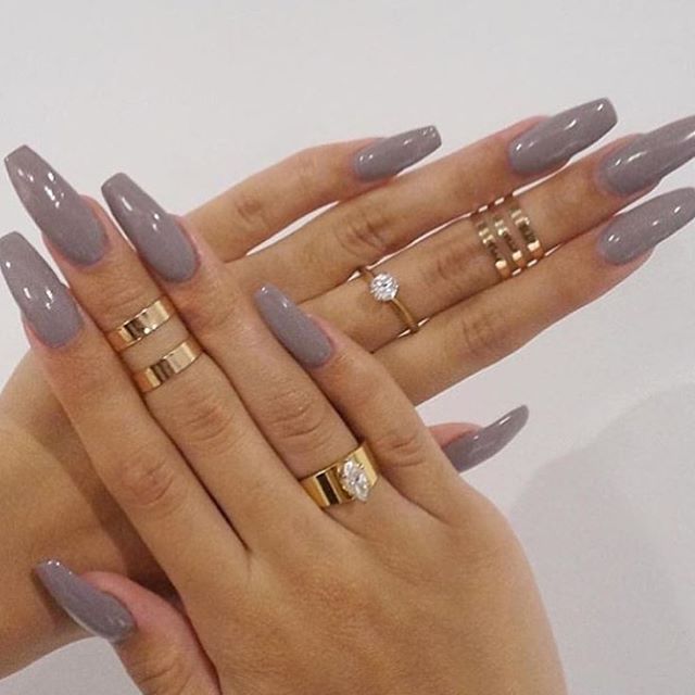 Chic Mauve Long Nails Enhanced by Glossy Finish and Glamorous Gold Rings