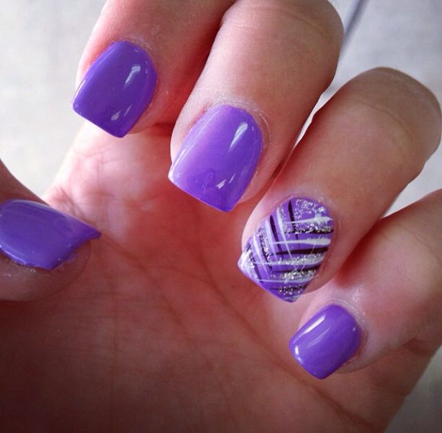 Bold Purple Nails with Chic Geometric Accent for a Playful yet Elegant Look.