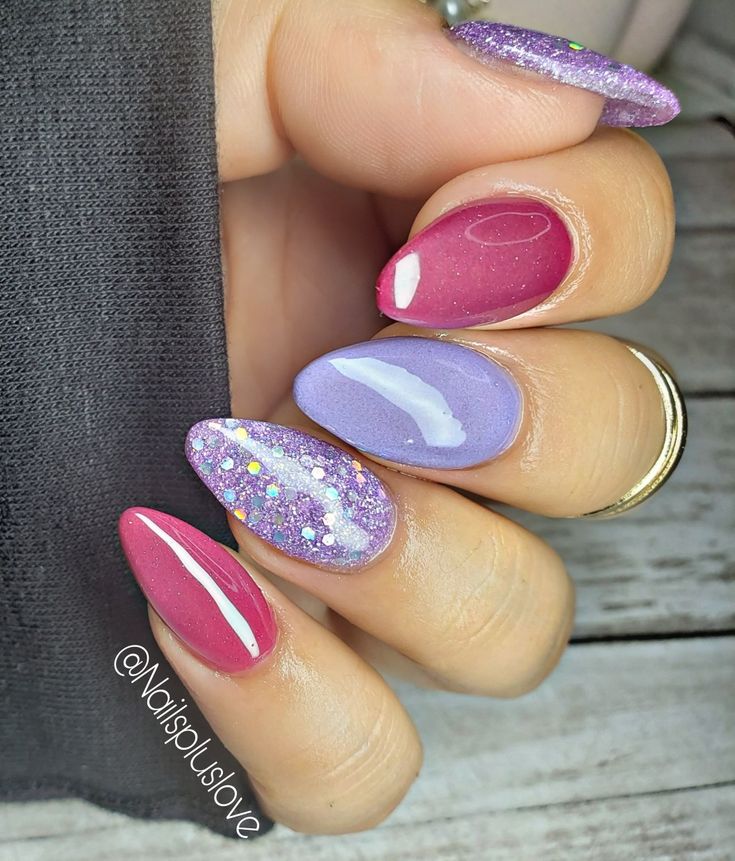 Chic Nail Design Showcasing Bold Colors and Sparkling Glitter Accents.