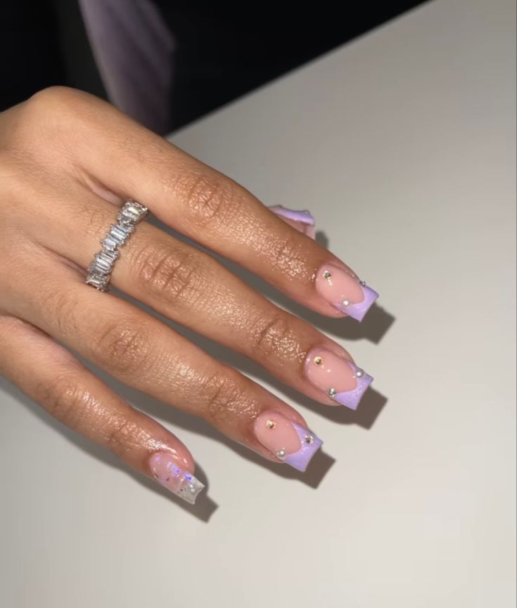 Elegant Oval Lavender-Tipped Nails with Sparkling Embellishments for Any Occasion