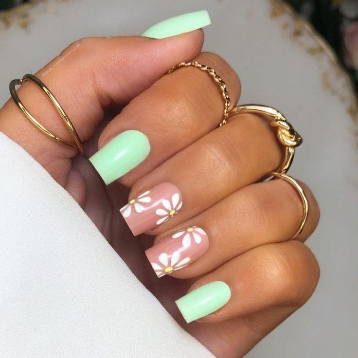 Elegant Pastel Nail Design: Soft Mint and Floral Pink Accents