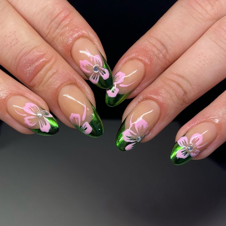 Vibrant Floral Nail Design with Green Tips and Elegant White Details