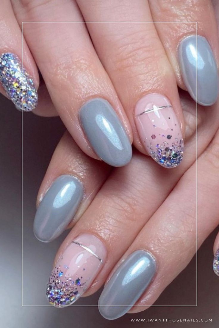 Chic Gray and Nude Glitter Nail Design with Glossy Finish and Metallic Accents.