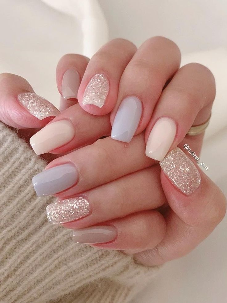 Sophisticated Pastel and Glitter Nail Design for Chic Elegance.