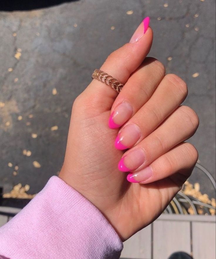 Chic Modern French Tip Manicure with Vibrant Pink Accents