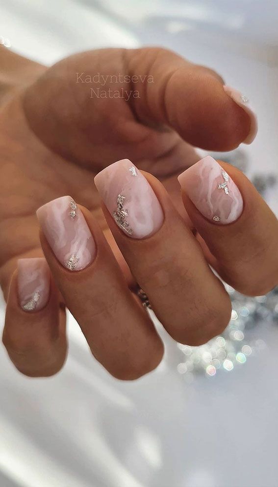 Sophisticated Marble Effect Nails with Pink, White, and Gold Accents for Chic Occasions