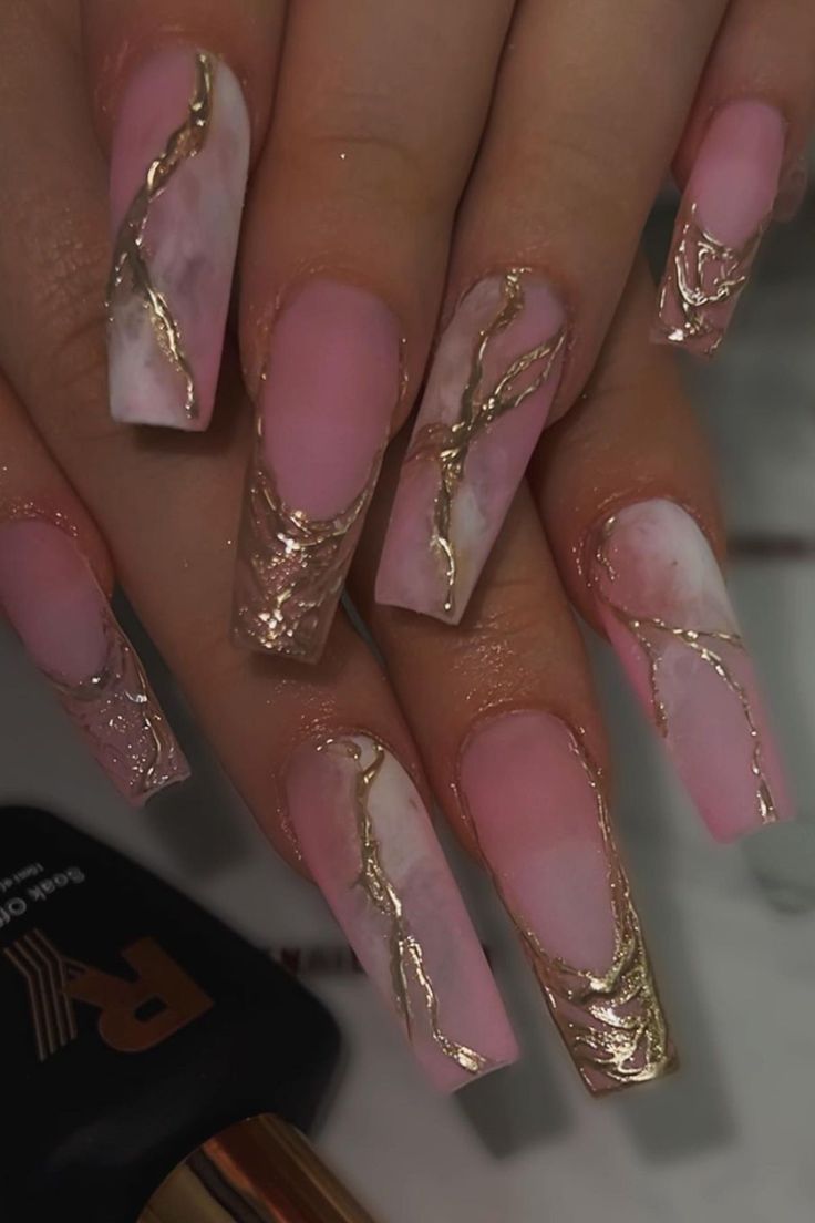 Chic Soft Pink Matte Nails with Marble and Luxe Gold Accents.