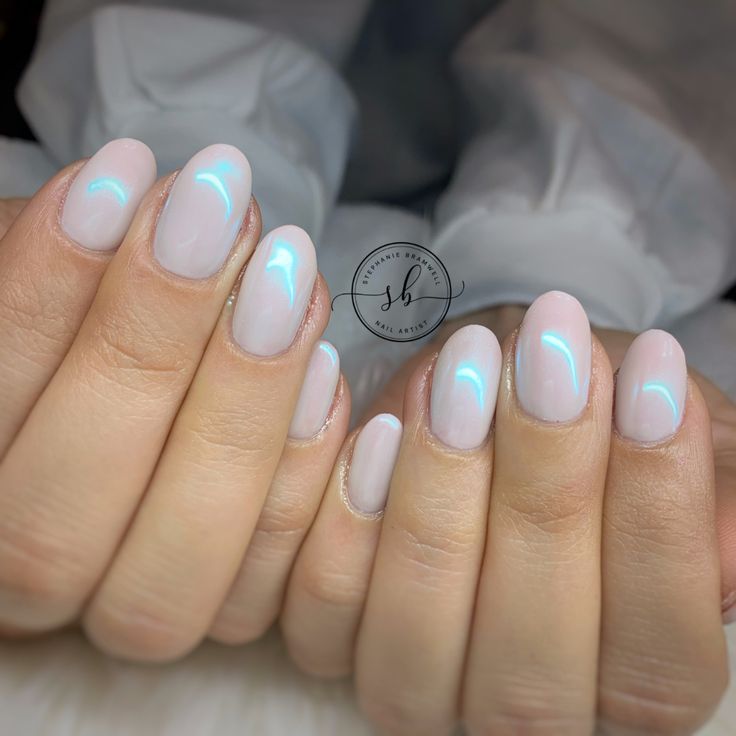 Elegant Delicate Nude Manicure with Sheer Pink Base and Iridescent Stripe.