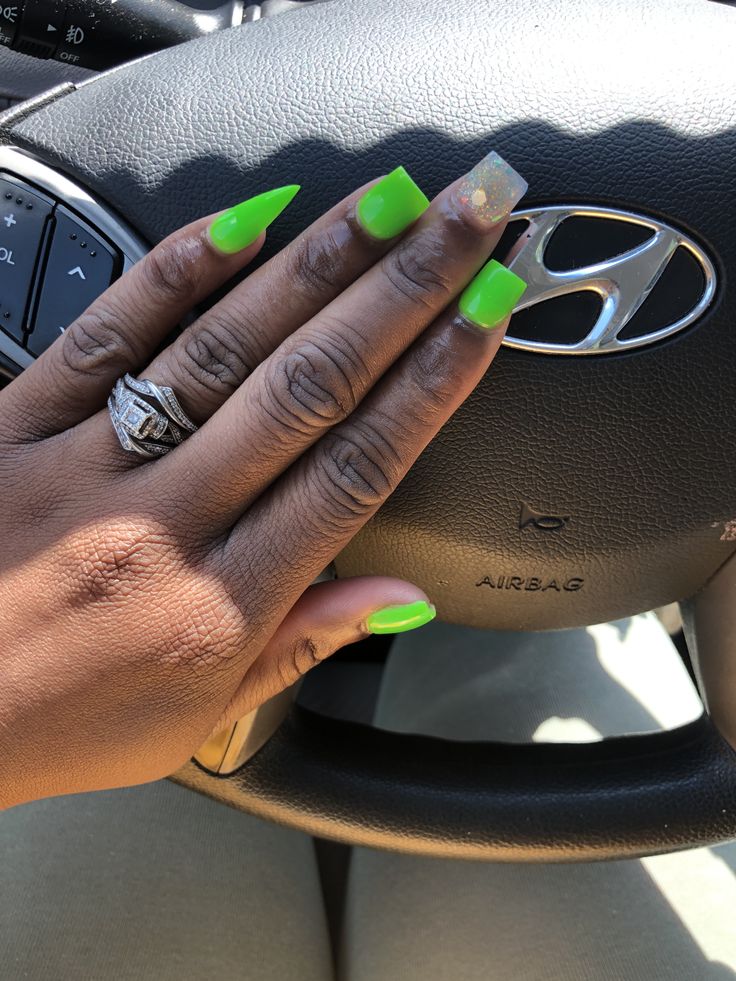 Bold Lime Green Glossy Nails with Sparkling Accent for Trendy Elegance.