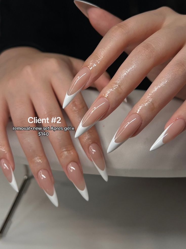 Chic Almond-Shaped Nails: Elegant Nude Base with Striking White Tips