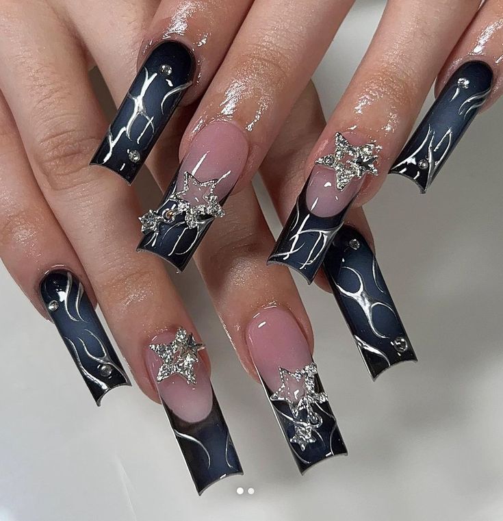 Chic Ombre Nail Design with Silver Detailing and Glamorous Glitter Accents.