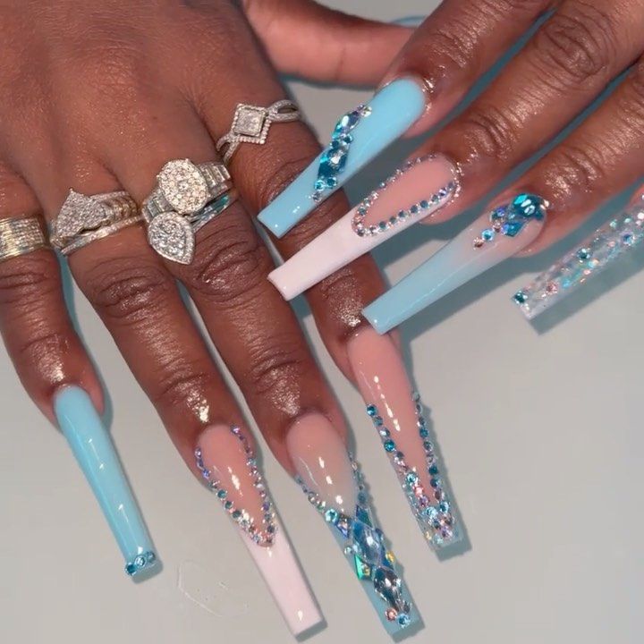 Glamorous Long Pastel Blue and Pink Nail Art with Rhinestones, Exuding Elegance and Glossy Radiance.