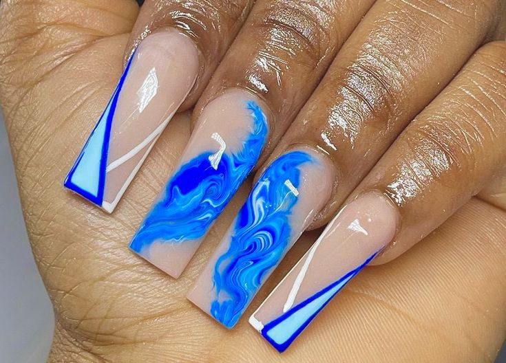 Elegant Blue Marbled Nail Design with Swirls and Geometric Accents