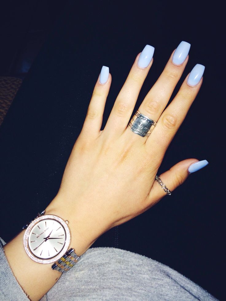 Chic Pastel Blue Long Nails with Elegant Accessories for a Modern Aesthetic.