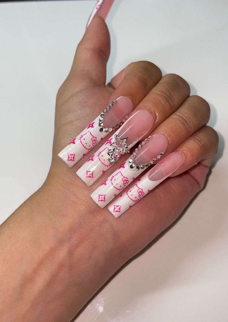 Whimsical Chic: Playful Patterns and Glam Rhinestones on Stylish Elongated Nail Tips