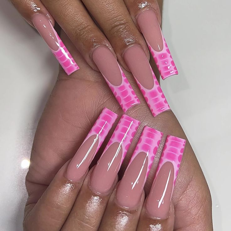 Vibrant Pink Pattern on Elongated Tips: A Modern and Playful Nail Design.