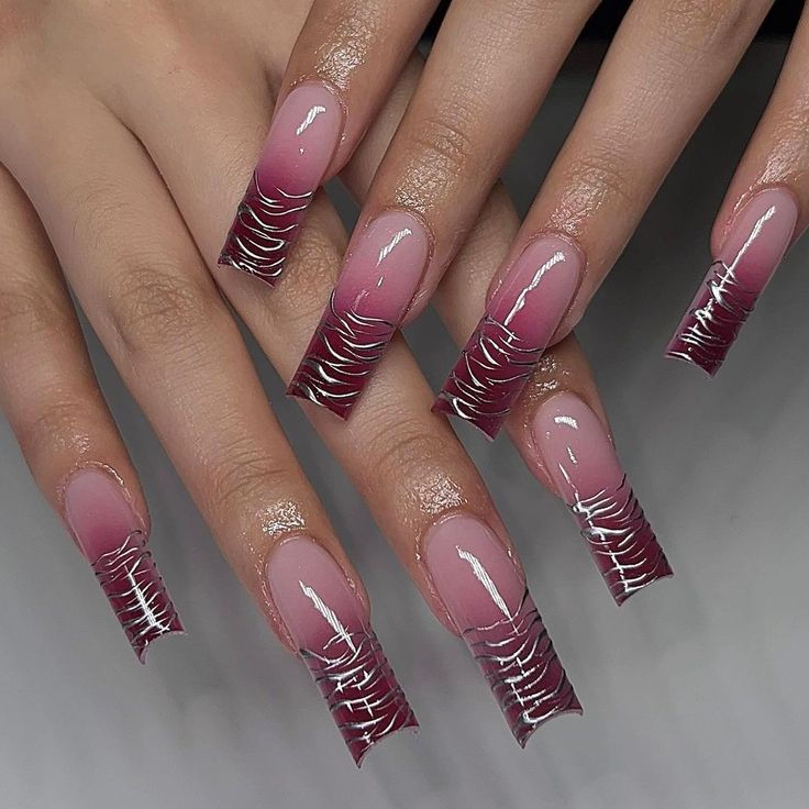 Elegant Ombre Nail Design: Soft Pink to Deep Burgundy with Silver Accents for a Chic Modern Look.