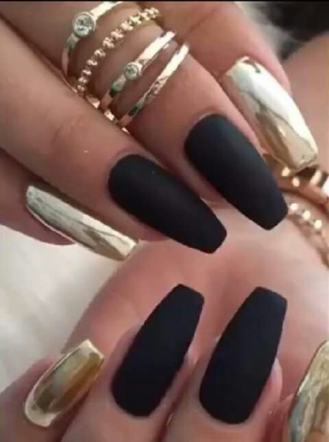 Elegant Matte Black and Metallic Gold Nail Design: Luxurious Glamour with a Contemporary Touch.