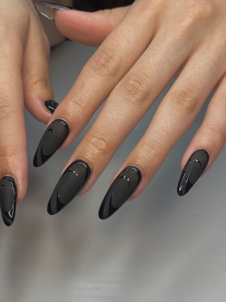 Chic Almond-Shaped Black Nail Design for Sophisticated Style