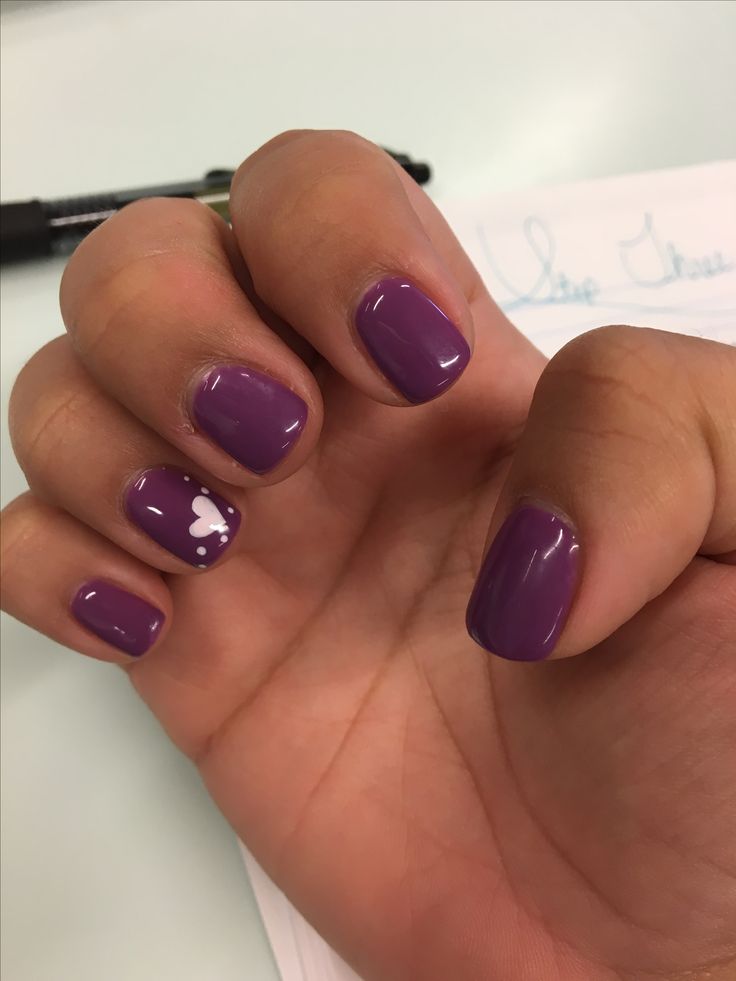 Glossy Purple Nail Design with Charming Heart Accent for Any Occasion