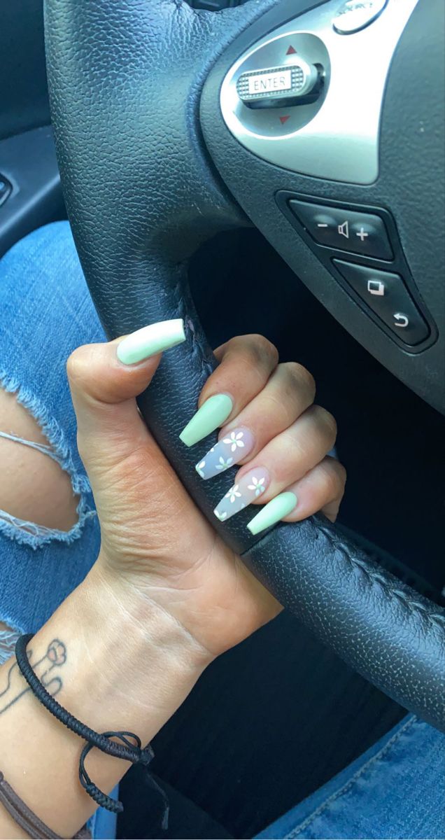 Sophisticated Soft Mint Green Coffin Nails with Whimsical White Floral Accents