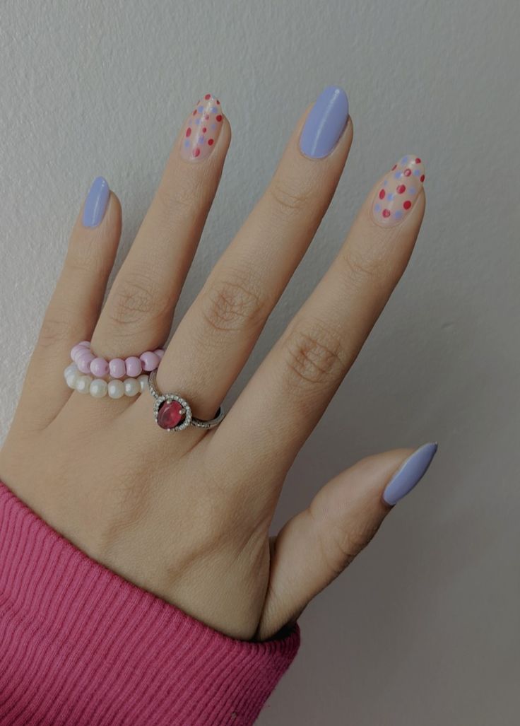 Playful Lavender Polka Dot Nails: A Whimsical and Trendy Manicure.