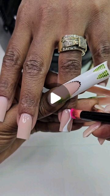 Chic Modern Nail Art: Elegant Nude Base with Creative Green Accents