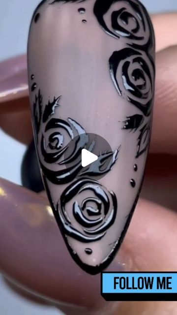 Elegant Floral Nail Art: Intricate Black Roses on Translucent Background.