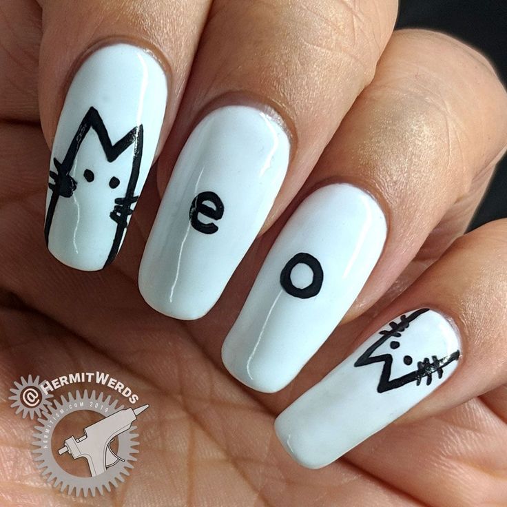 Charming Minimalistic Cat-Themed Nail Art for Cat Lovers.