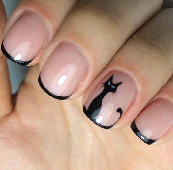 Chic Cat-Inspired Nail Design: Nude Base with Black French Tips