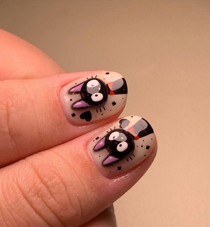 Playful Cartoon Cat Nail Design Adds Character with Whimsical Charm.