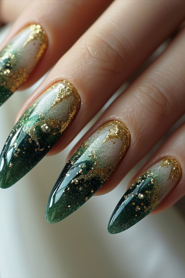 Sophisticated Gradient Nail Design: Deep Green and Soft Gold with Glitter Accents