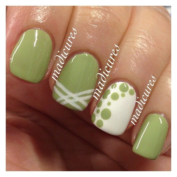 Minimalist Green Nail Design: Fresh and Chic with Accent Details.