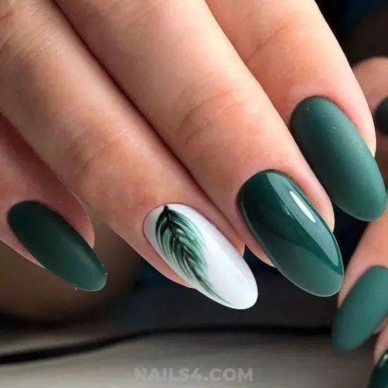 Chic Green Nail Design with Matte-Gloss Finish and Intricate Leaf Art.