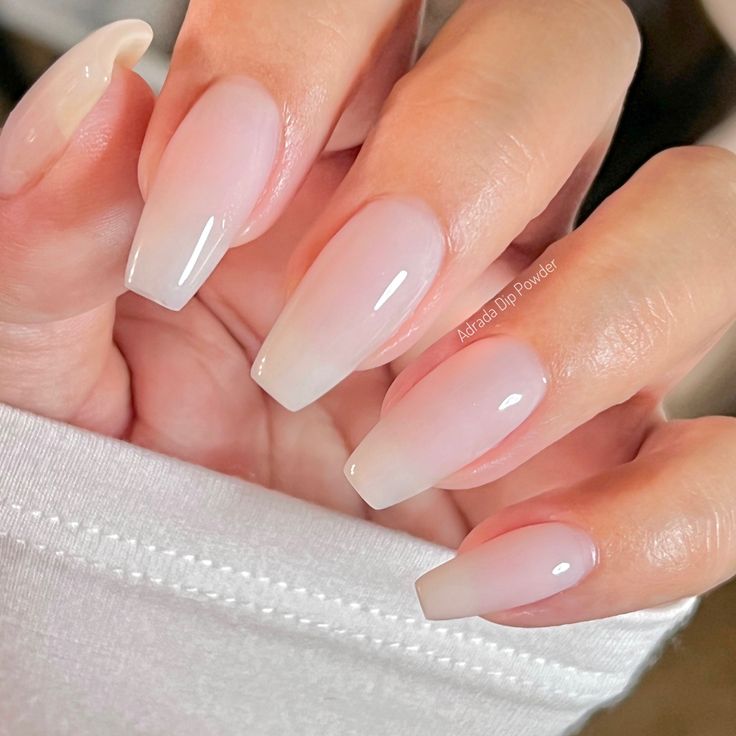 Sophisticated Ombre Nails: A Classy Transition from Pale Pink to Sheer White.