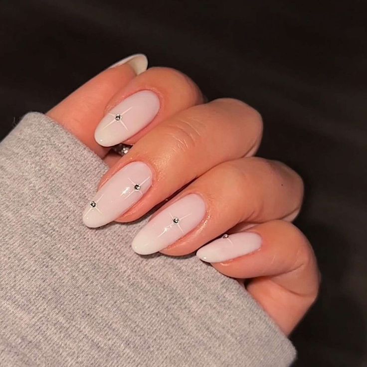 Sophisticated Ombre Nail Design with Sparkling Accent Stones