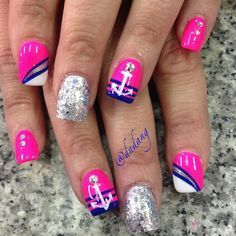 Vibrant Pink Nautical Nail Design with Stripes and Glittering Anchor Details