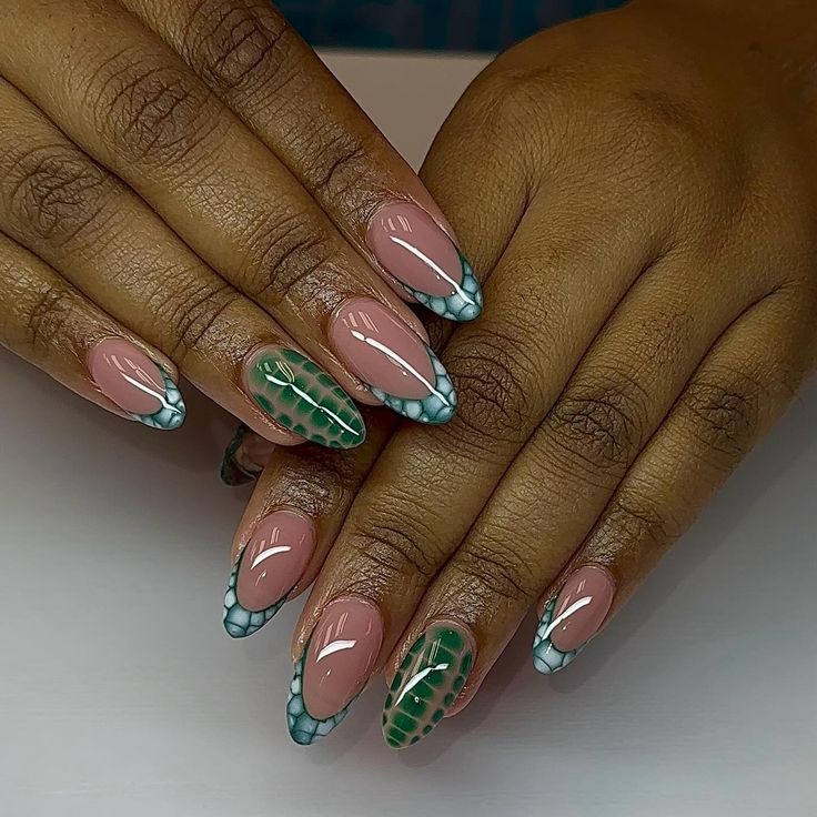 Chic Almond-Shaped Nail Design with Natural Pink, Vibrant Green, and Striking Blue Accents.