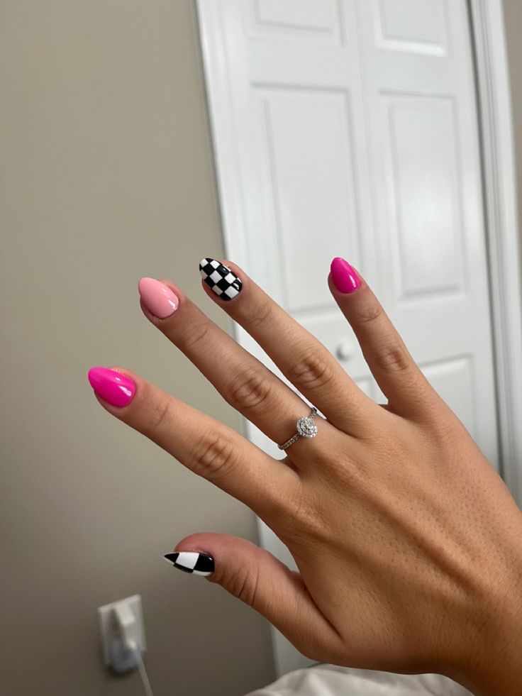 Chic Playful Nail Design: Bold Colors and Patterns with Checkered Accents