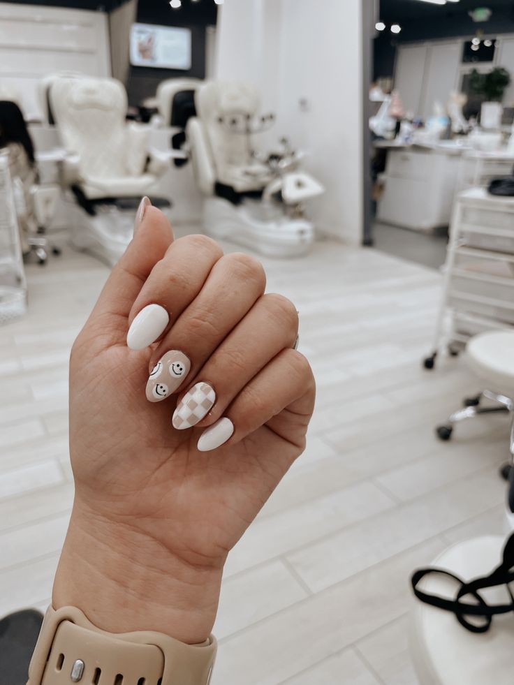 Whimsical Nail Design Blending Bright Whites and Pastels with Cheerful Details.