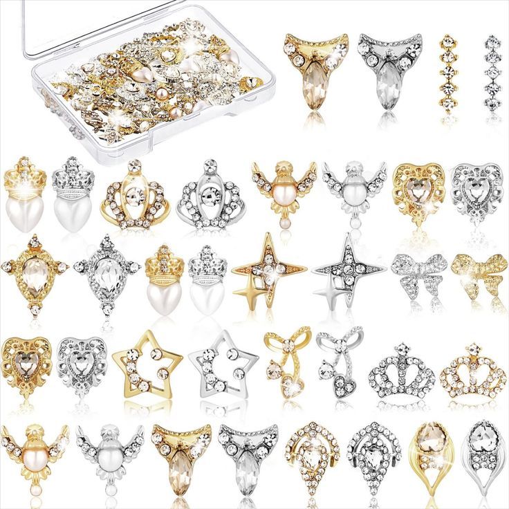 Elegant Display of Decorative Nail Charms Featuring Intricate Designs and Glamorous Accents.