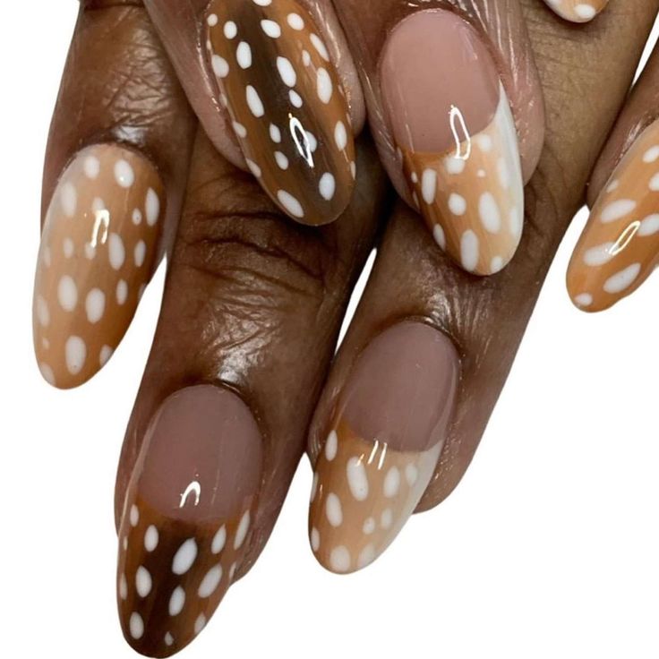 Chic Nail Design: Beige, Brown, and Cream with Playful Polka Dots and Varied Finishes.