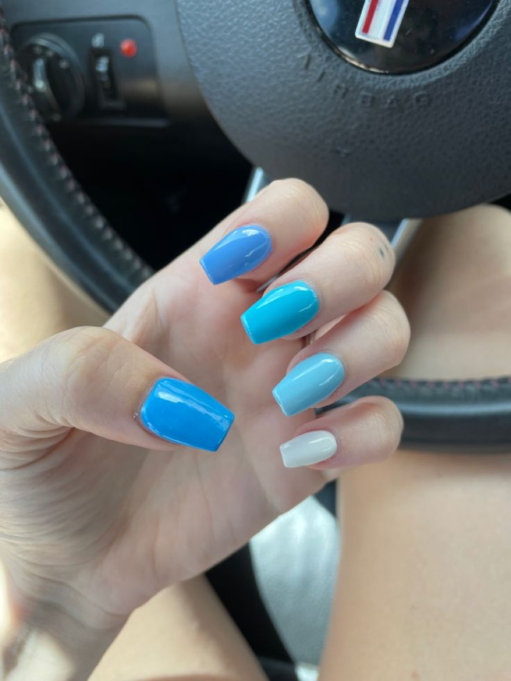 Gradient Blue Nail Design with White Accent for a Modern and Polished Look.