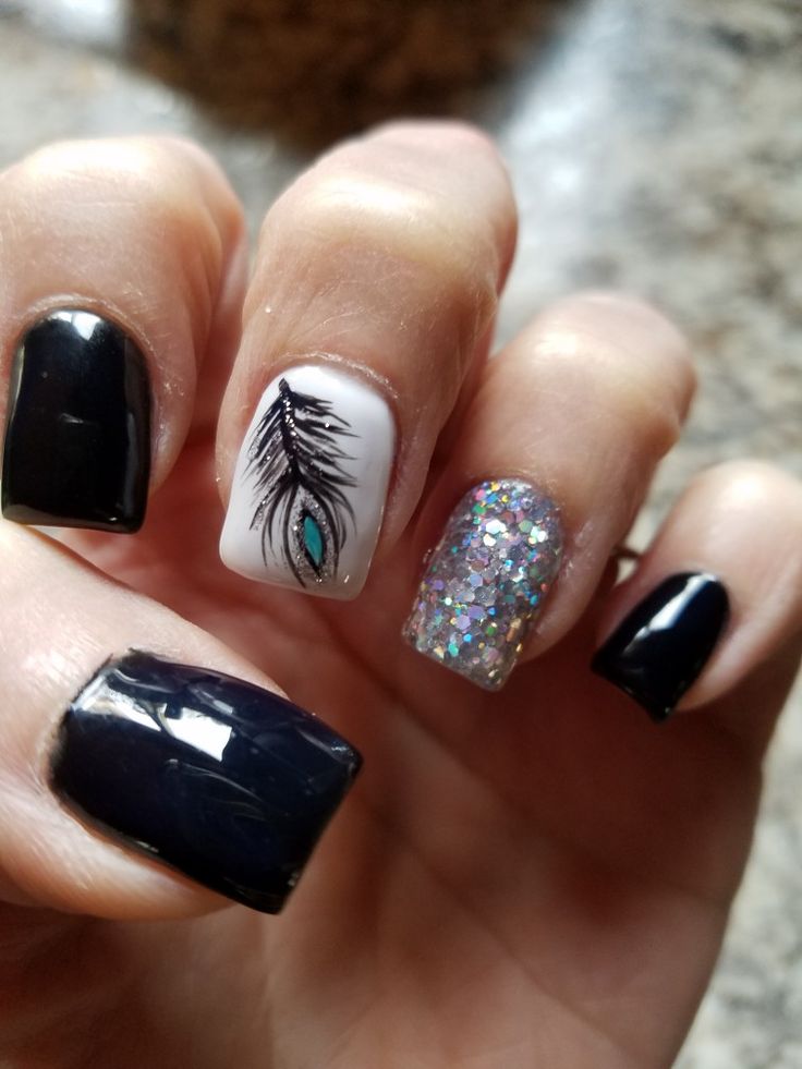 Nails With Feathers Design