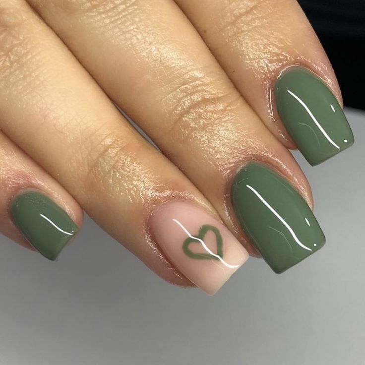 Chic Nail Design: Muted Green Shades with Heart Accent for Versatile Elegance