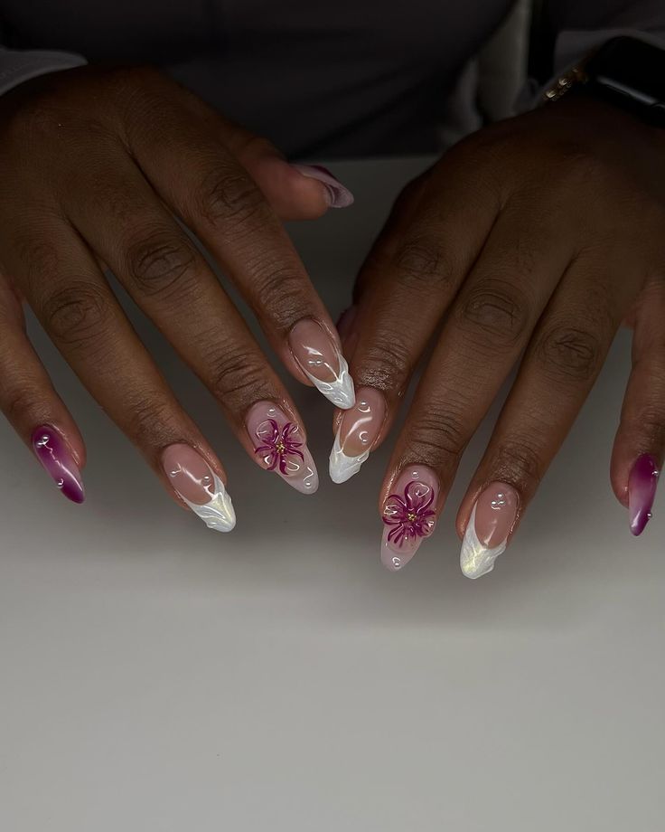 Sophisticated Nail Design: Soft Pink and Vibrant Purple with Delicate French Tips and Floral Accents