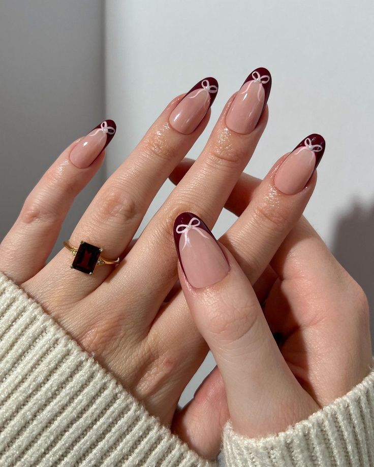 Elegant Maroon French Tip Nails with White Bows: Chic, Playful, and Perfect for Any Occasion.