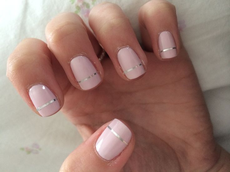 Chic and Versatile Elegant Nail Design with Soft Pink Base and Subtle Silver Stripes