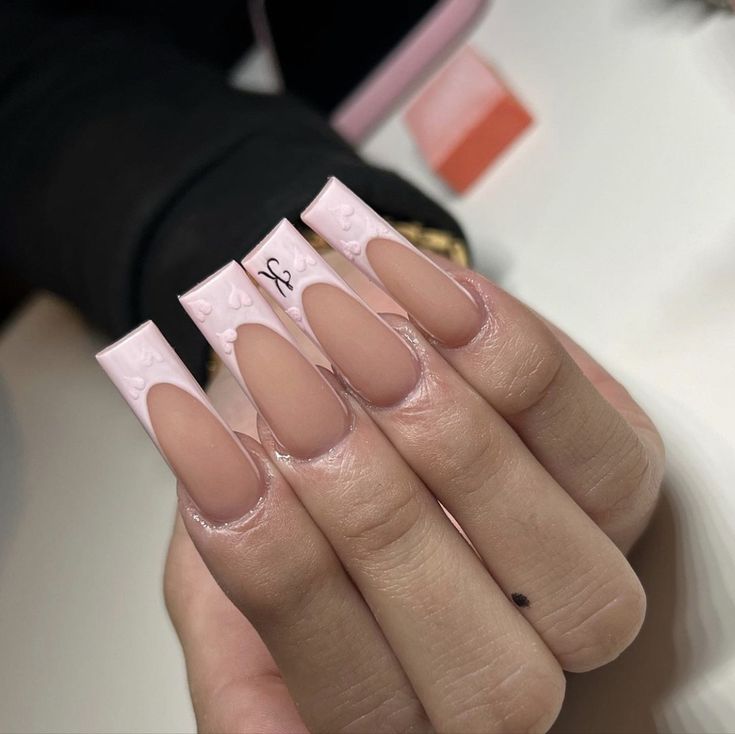 Chic Long Square Nails: Stylish Matte and Glossy Manicure with Elegant Patterns and Soft Pink Base.