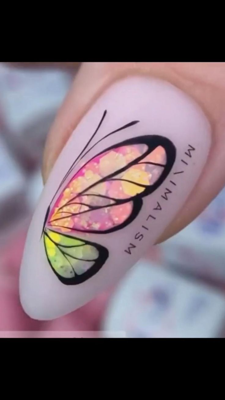 Whimsical Butterfly Nail Art with Vibrant Colors and Elegant Detailing.